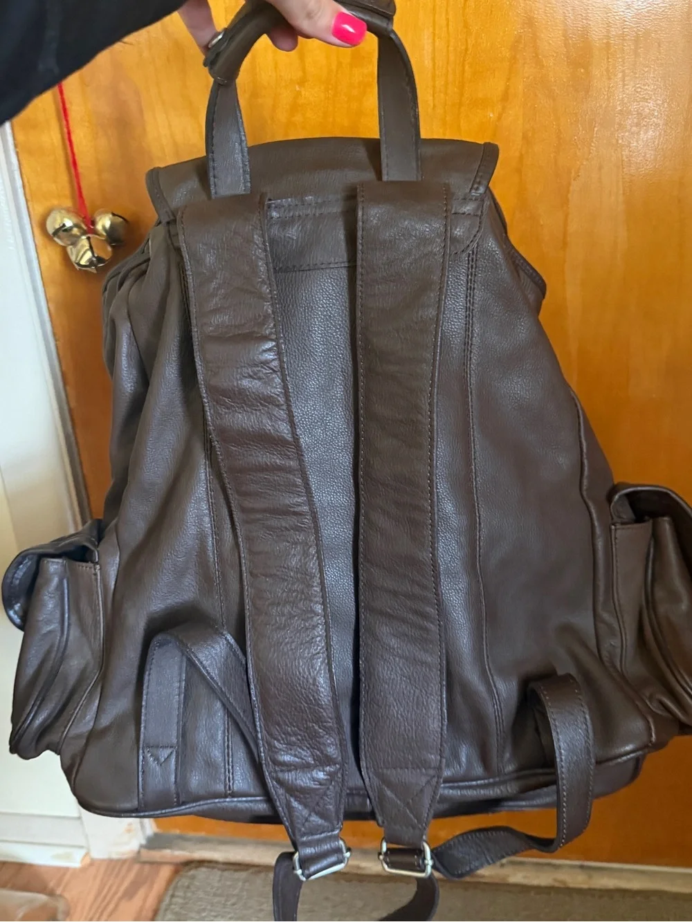 Dark Brown Leather Drawstring Backpack with Silver Hardware